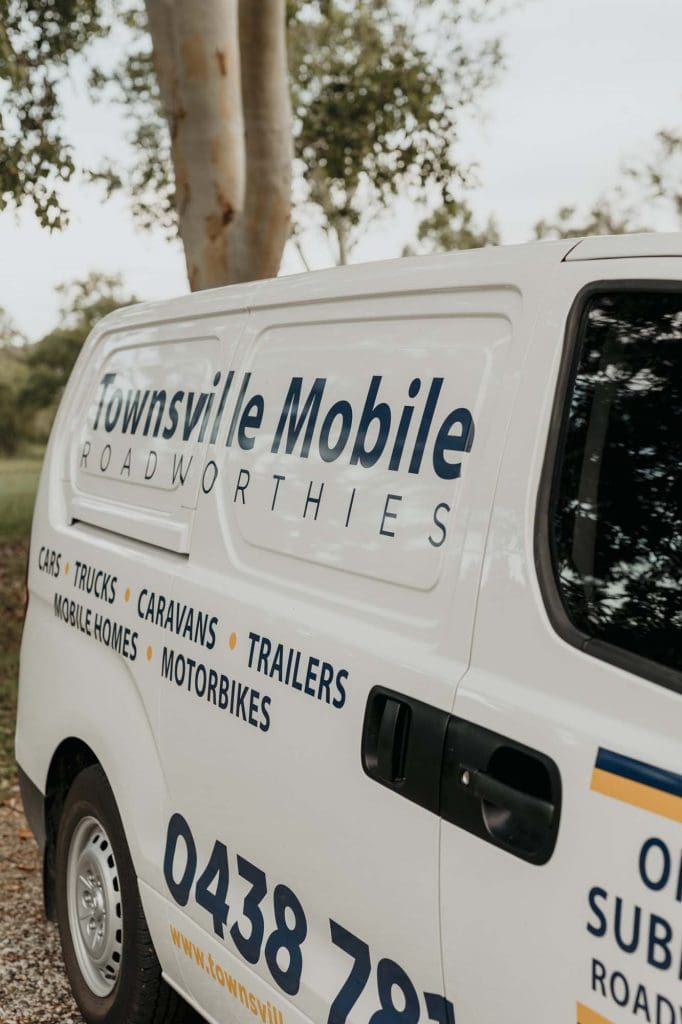 Townsville Mobile Roadworthies branded service vehicle parked and ready for a mobile safety certificate inspection.